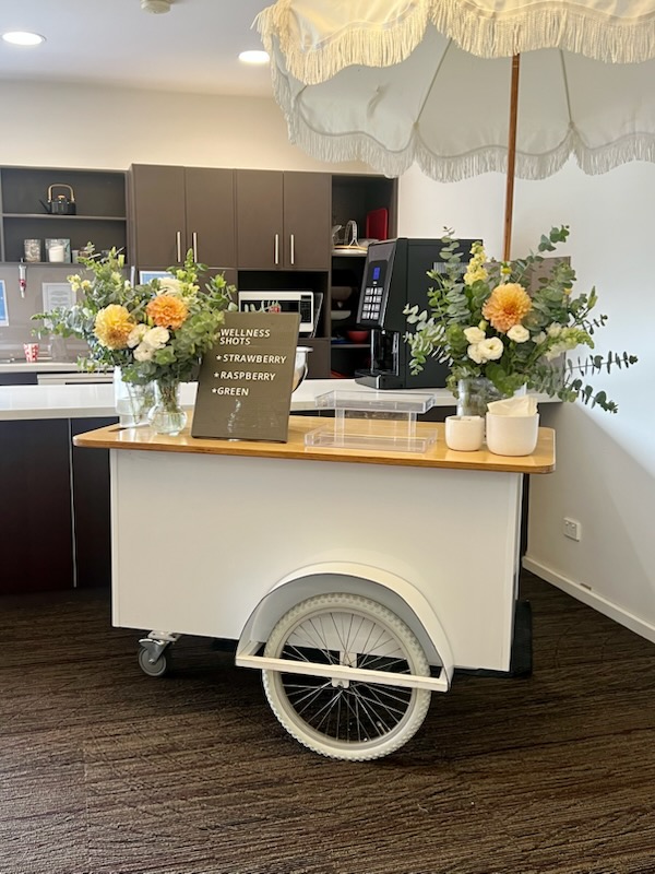 Gathering Events juice cart serving fresh shots at Cumberland View Open Day